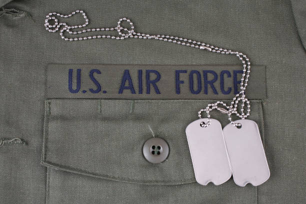 istock U.S. AIR FORCE Branch Tape with dog tags on olive green uniform 1210970718