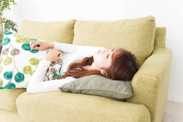 istock Young woman relaxing in the room 1210972184