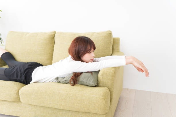 istock Young woman relaxing in the room 1210972795