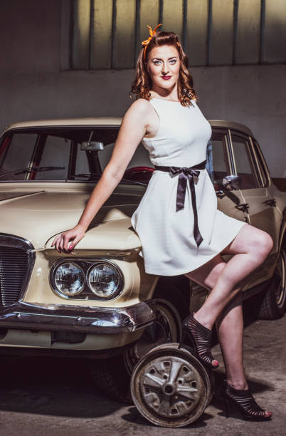 istock Female driver and her vintage car 1210972801