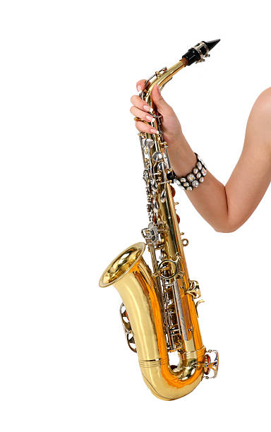 Saxophone in the women's hand stock photo