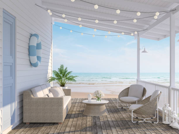 The wooden house terrace on the beach 3d render The wooden house terrace on the beach 3d render,Tthere has old wooden floors,white plank walls,blue doors decorated with fabric and rattan furniture, decorated with string lights, overlooking the sea. hut stock pictures, royalty-free photos & images