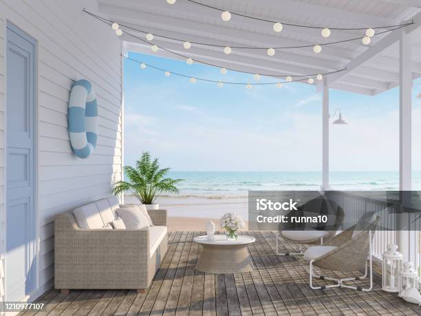 The Wooden House Terrace On The Beach 3d Render Stock Photo - Download Image Now - Beach, Cottage, Sea