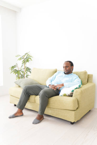 istock Black man relax at home 1210978455