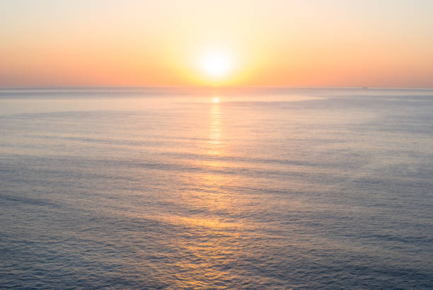 istock quiet sea bay scene at the sunset 1210979040