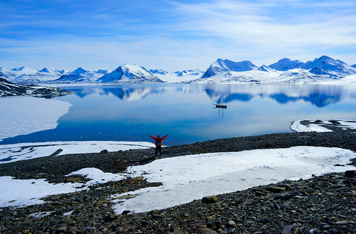 Man hiking in Spitsbergen Mountain scene of the Spitsbergen Mountains in Isfjord