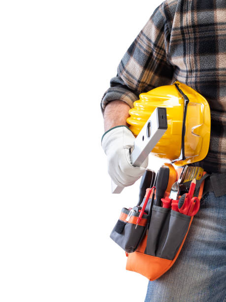 istock Electrician with tool belt on a white background. Electricity. 1210979922