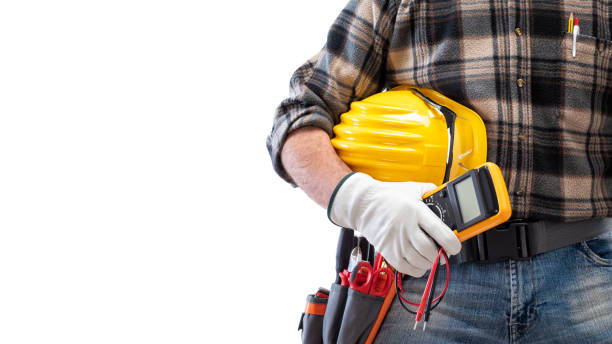 istock Electrician with tool belt on a white background. Electricity. 1210979931