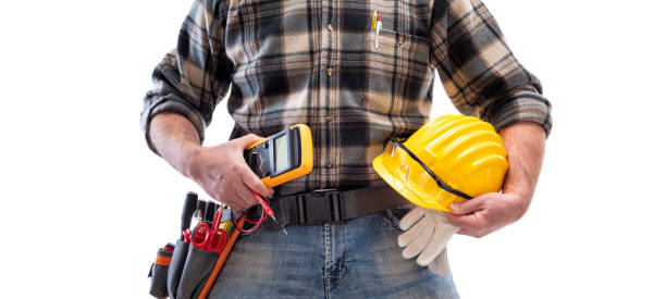 istock Electrician with tool belt on a white background. Electricity. 1210979933