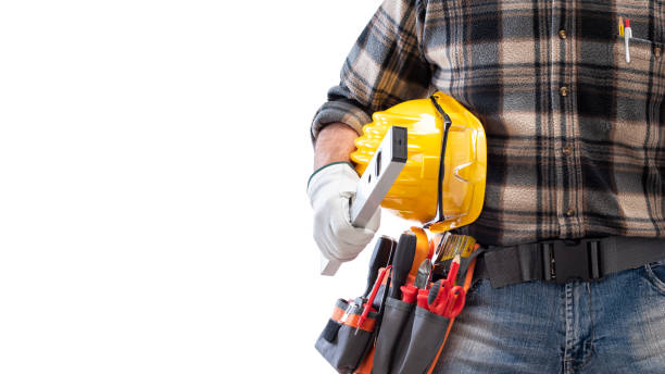 istock Electrician with tool belt on a white background. Electricity. 1210980170