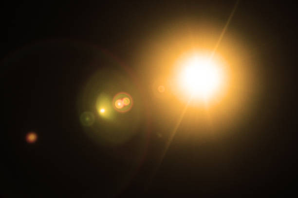 istock Abstract Natural Sun flare or Far star on the black background 1210980284