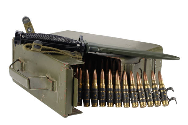istock Green Ammo Box with ammunition belt and bayonet 1210983486