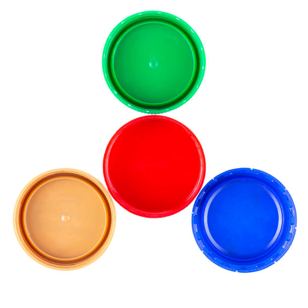 istock Plastic bottle screw caps isolated on white background. 1210985175