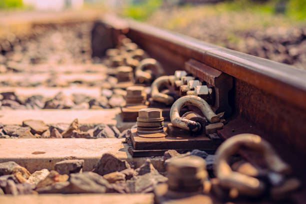 istock Selective focus railway brackets or fasteners.Vintage color concept 1210986087
