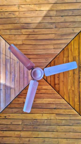 Image of fan with wooden background. Image of colorful fan with amazing wooden background at Gandhi Ashram, Ahmedabad. old fashioned ceiling fans stock pictures, royalty-free photos & images