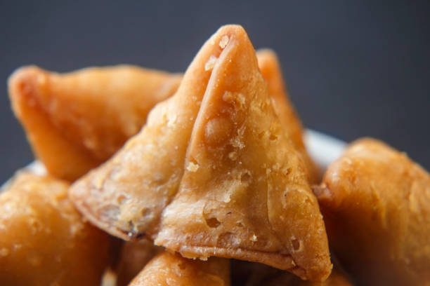 istock Gujiya  Samosa an Indian Holi special snacks 1210992082