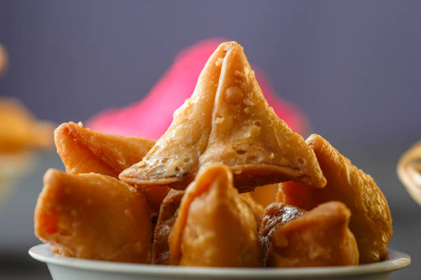 istock Gujiya  Samosa an Indian Holi special snacks 1210992208