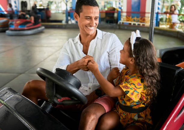 istock Perfect summer day with father in amusement park 1210993012