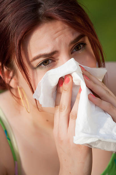 istock woman with allergy sneezing 121099309