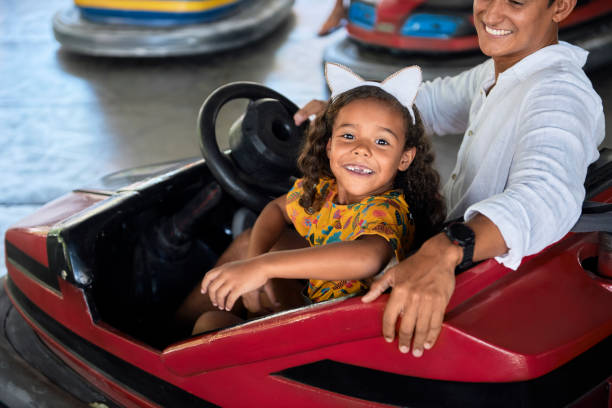 istock Perfect summer day with father in amusement park 1210993142