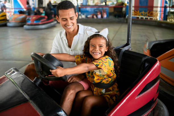 istock Perfect summer day with father in amusement park 1210993408