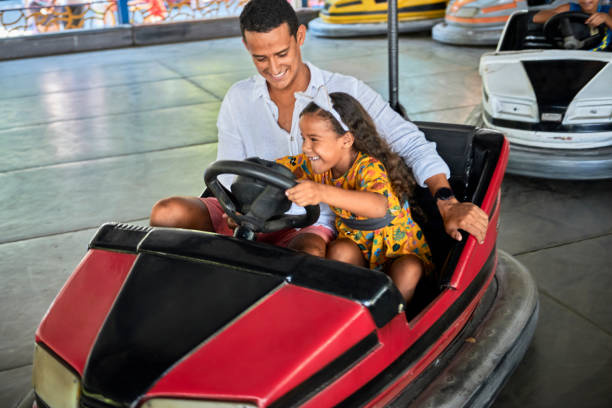 istock Perfect summer day with father in amusement park 1210994924