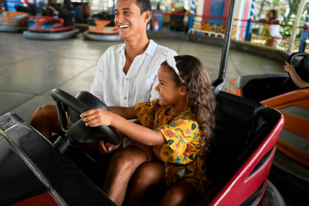 istock Perfect summer day with father in amusement park 1210994930