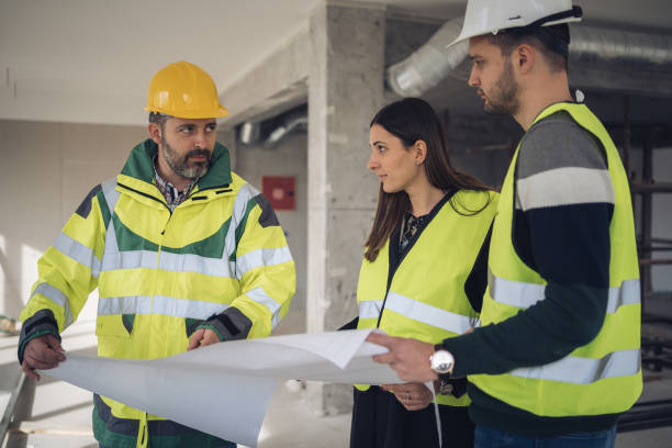 istock A team of young architects and engineers are analyzing the project at the construction site 1210999349