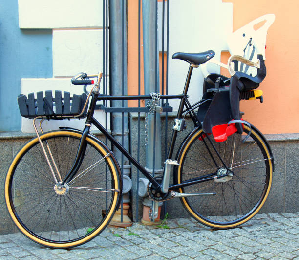 istock Parked bike on the building 1210999809