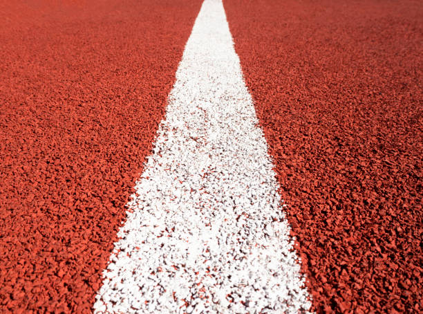 pista de atletismo roja - sports competition format outdoors macro stadium fotografías e imágenes de stock