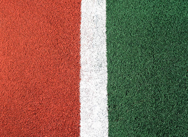 istock Color rubberized asphalt sports stadium 1211001853