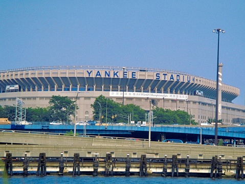 Yankee Stadium (old) in the Bronx, New York, on a sunny day.