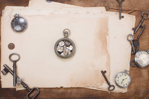 istock old papers and pen with vintage pocket watch 1211007303