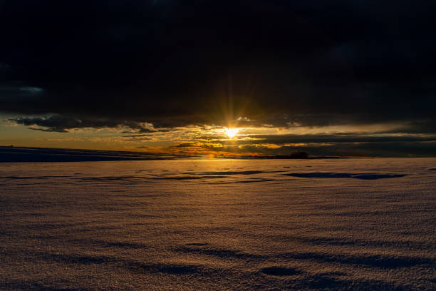 istock A Beautiful Sunrise over the Snowy Plains 1211007319