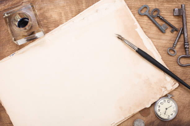 istock old papers and pen with vintage pocket watch 1211007361