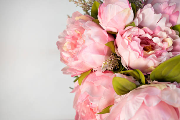 istock bouquet of pink peonies  on white  background copy space 1211008682