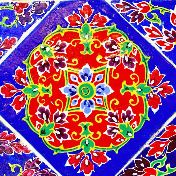istock Old wall ceramic tiles patterns handcraft from thailand temple wall public 1211008783