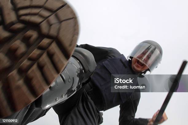 Policeman At Work Stock Photo - Download Image Now - Police Force, Violence, Domination