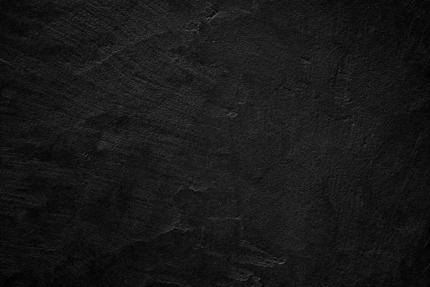 istock Dark grey black slate texture in natural pattern with high resolution for background and design art work. Black stone wall. 1211016817