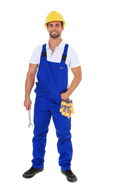 istock Isolated construction worker in a hard hat with a wrench 121102256