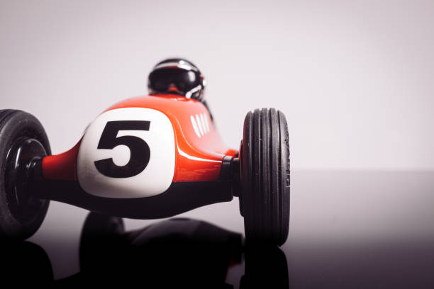 istock Red old racing car with number five painted on it 1211025200