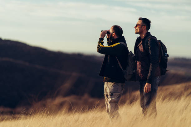 istock Two friends hiking in the hills 1211029096