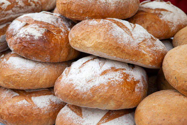 Fresh and crispy round bread on a market stall