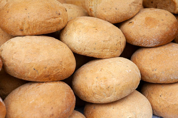 Fresh and crispy round bread on a market stall