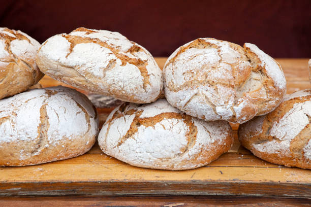 Fresh and crispy round bread on a market stall
