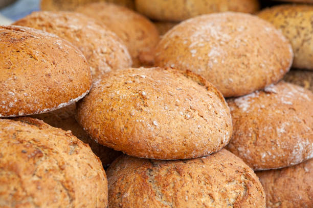 Fresh and crispy round bread on a market stall