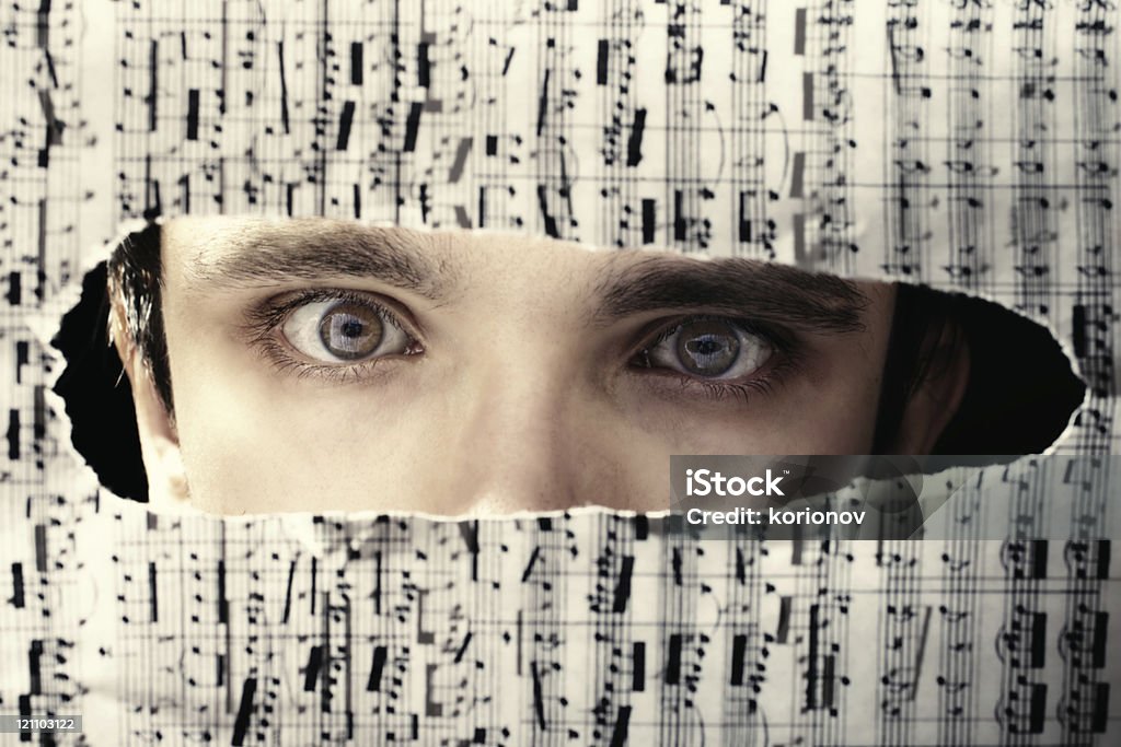 Scary ojos de hombre - Foto de stock de Hoja de Partitura libre de derechos