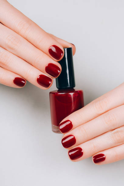 Manicure and bottle of nail polish