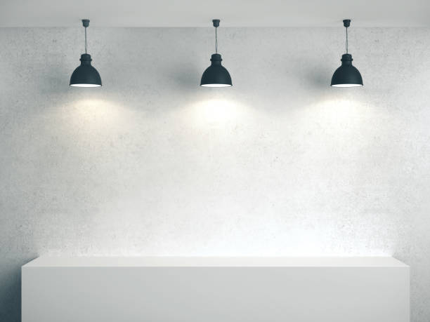 istock Blank concrete wall, podium and three lamp. 1211034398