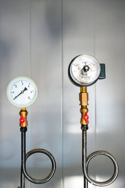 istock Pressure gauge with the Perkins tube. Vertical 1211042809
